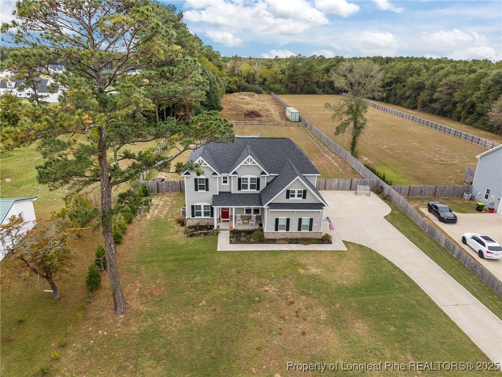 3079 Wade-Stedman Road Stedman, NC 28391 - Photo 2 of 50 a view of a city with a building in the background