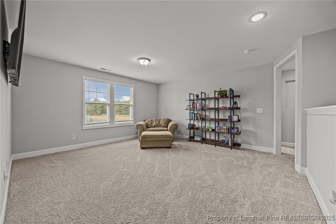 3079 Wade-Stedman Road Stedman, NC 28391 - Photo 24 of 50 a view of empty room with windows and cabinet