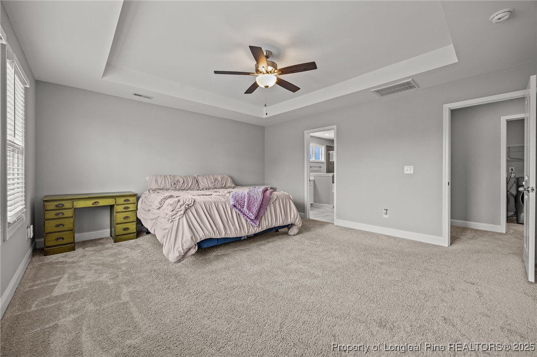 3079 Wade-Stedman Road Stedman, NC 28391 - Photo 28 of 50 a bed room with a bed and ceiling fan