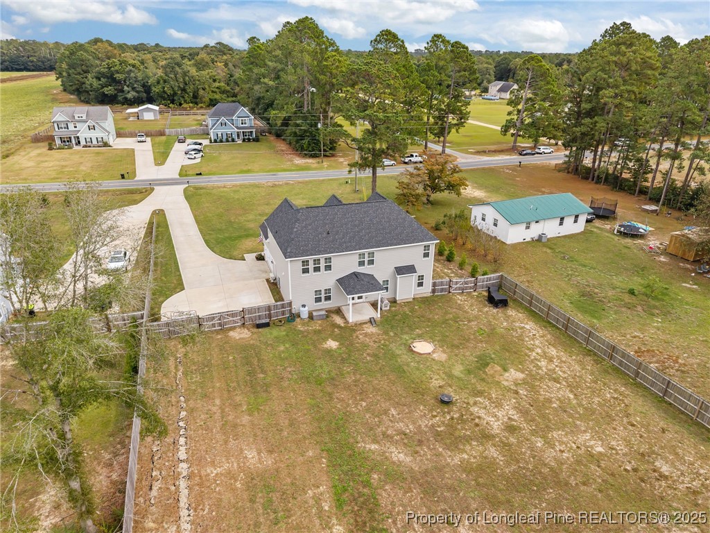 3079 Wade-Stedman Road Stedman, NC 28391 - Photo 3 of 50 a view of a swimming pool with a lake view