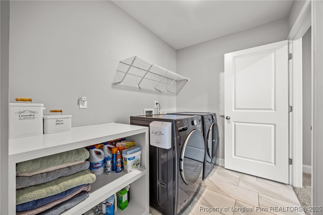 3079 Wade-Stedman Road Stedman, NC 28391 - Photo 35 of 50 a utility room with multiple dryer and washer