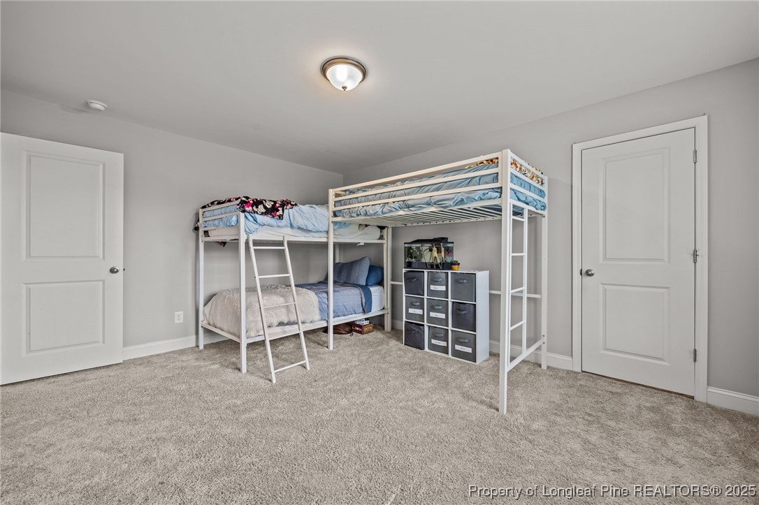 3079 Wade-Stedman Road Stedman, NC 28391 - Photo 36 of 50 an empty room with furniture and a ceiling fan