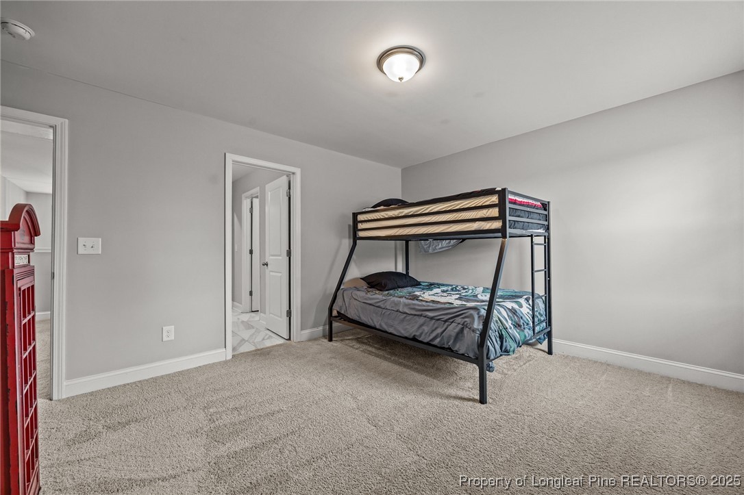 3079 Wade-Stedman Road Stedman, NC 28391 - Photo 44 of 50 a bedroom with bunk bed