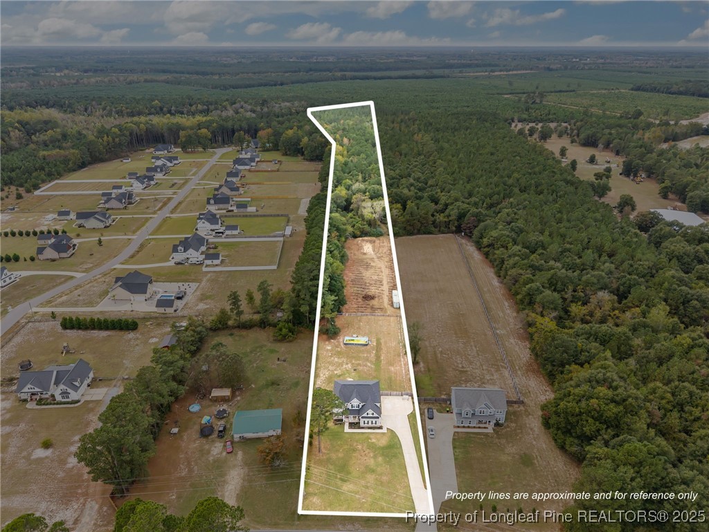 3079 Wade-Stedman Road Stedman, NC 28391 - Photo 45 of 50 an aerial view of a residential houses with outdoor space