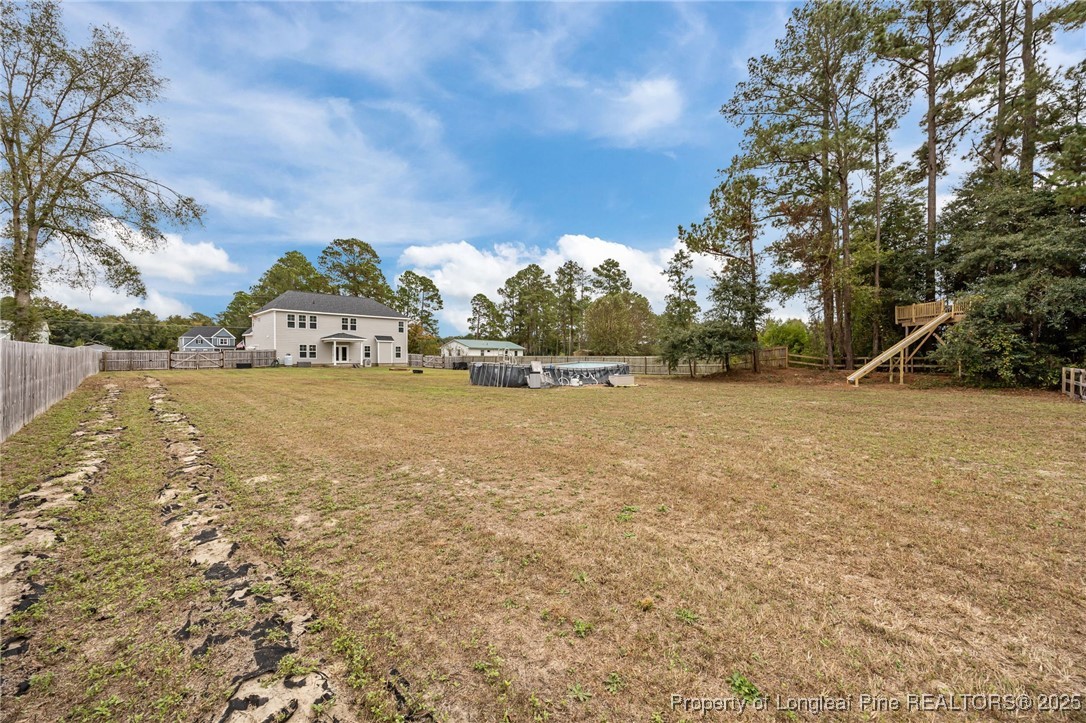 3079 Wade-Stedman Road Stedman, NC 28391 - Photo 48 of 50 a view of swimming pool next to a yard