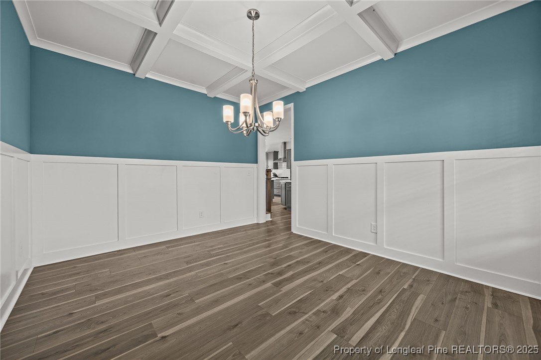3079 Wade-Stedman Road Stedman, NC 28391 - Photo 6 of 50 a view of a room with wooden floor ceiling fan and a window