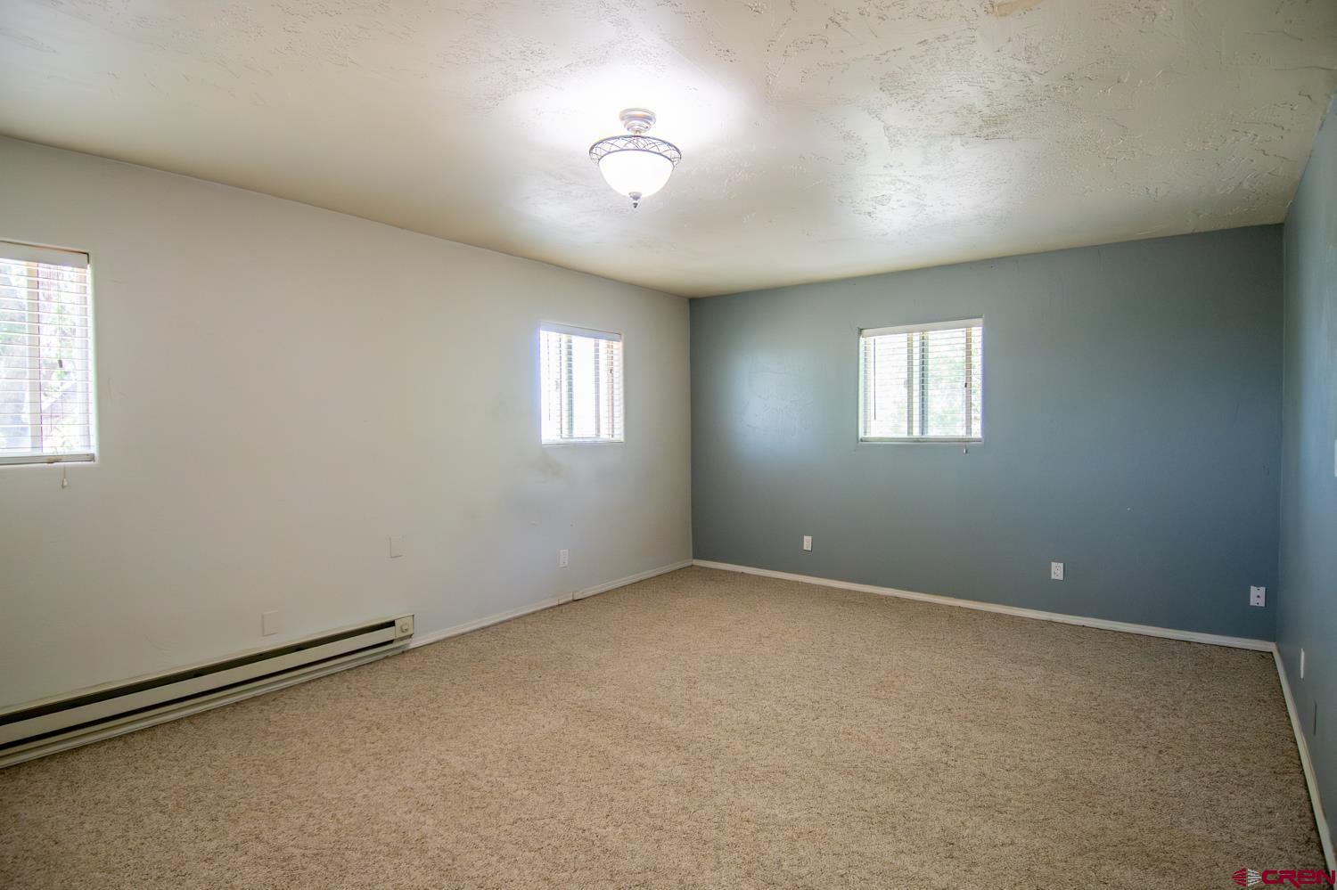 5200 Road 21 Cortez, CO 81321 - Photo 11 of 38 a view of an empty room with a window