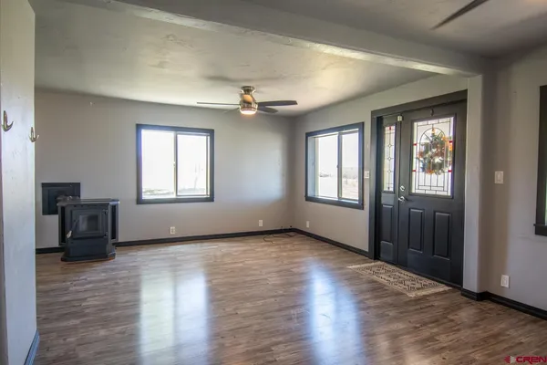 a view of an empty room with a window