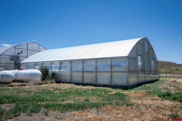 a view of a room with furniture