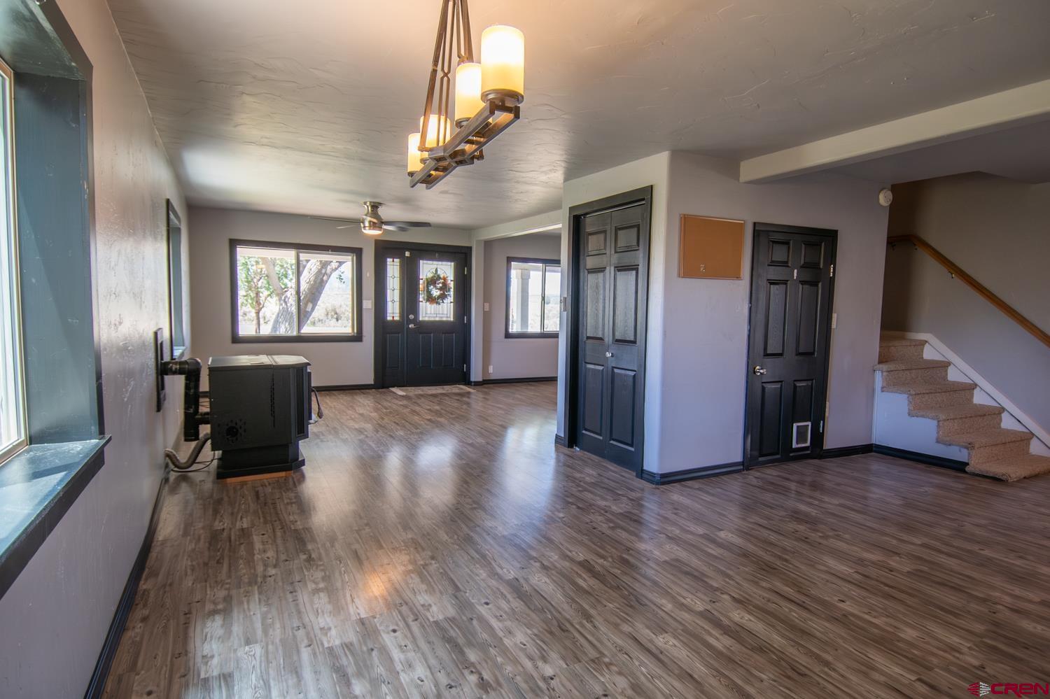 5200 Road 21 Cortez, CO 81321 - Photo 37 of 38 a living room with furniture and a wooden floor
