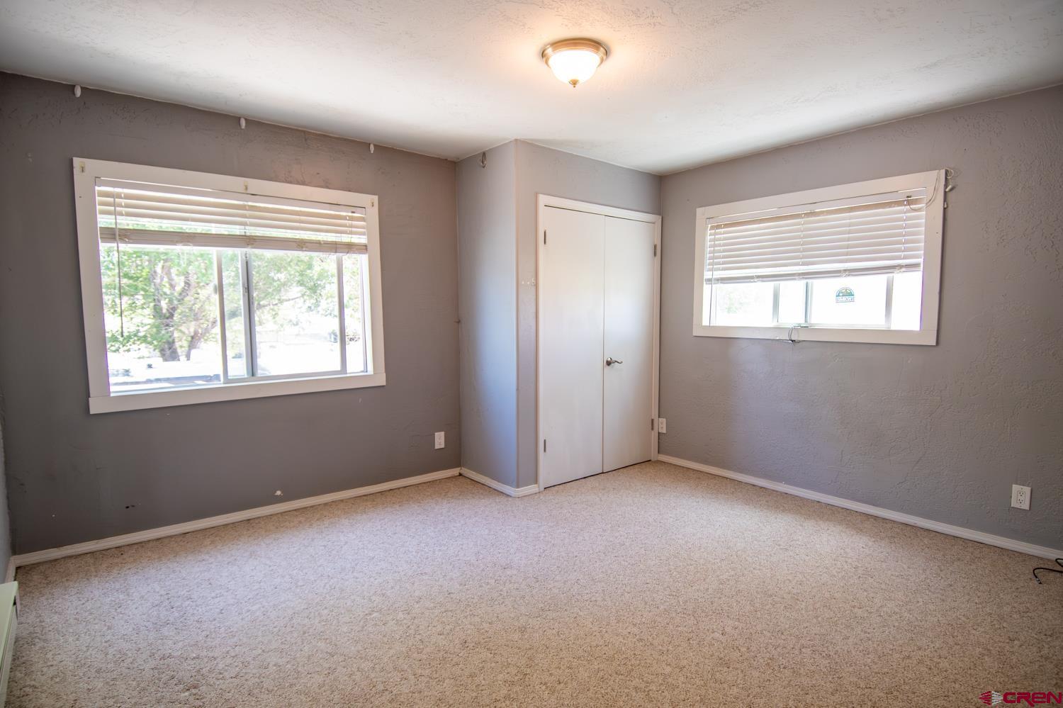 5200 Road 21 Cortez, CO 81321 - Photo 7 of 38 a view of an empty room with a window