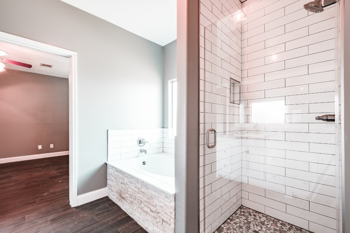 8515 Holly Spring Lane Baytown, TX 77523 - Photo 18 of 28 Separate shower and soaking bath