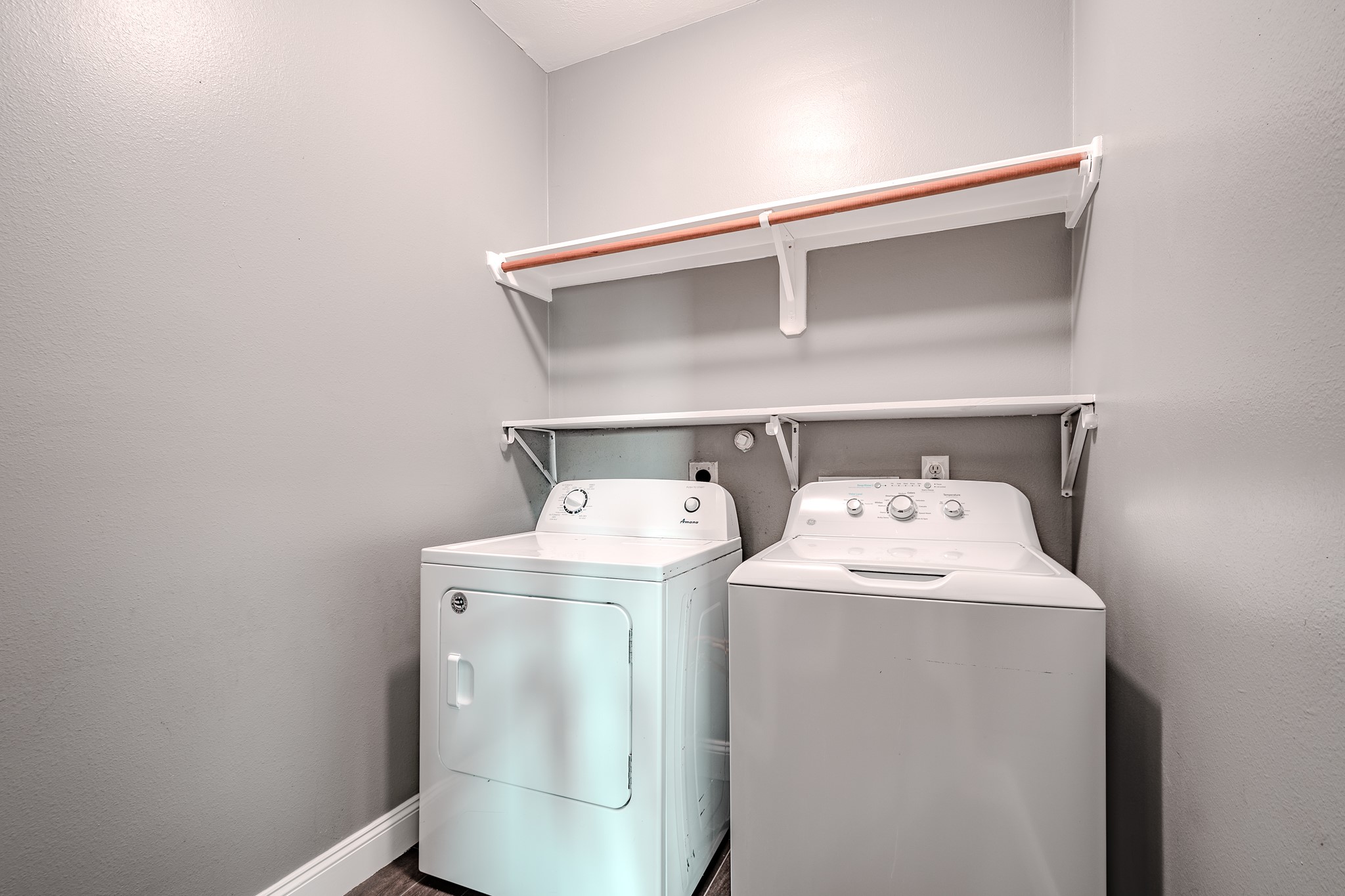 8515 Holly Spring Lane Baytown, TX 77523 - Photo 25 of 28 a utility room with dryer and washer