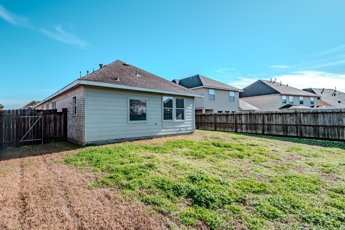 8515 Holly Spring Lane Baytown, TX 77523 - Photo 28 of 28 Enjoy this large backyard, plenty of room for the kids to play and the adults to relax!