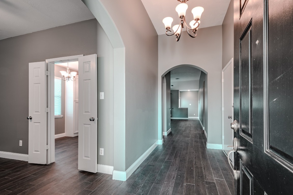 8515 Holly Spring Lane Baytown, TX 77523 - Photo 6 of 28 Entry with dining room to the left, continue forward into family room.