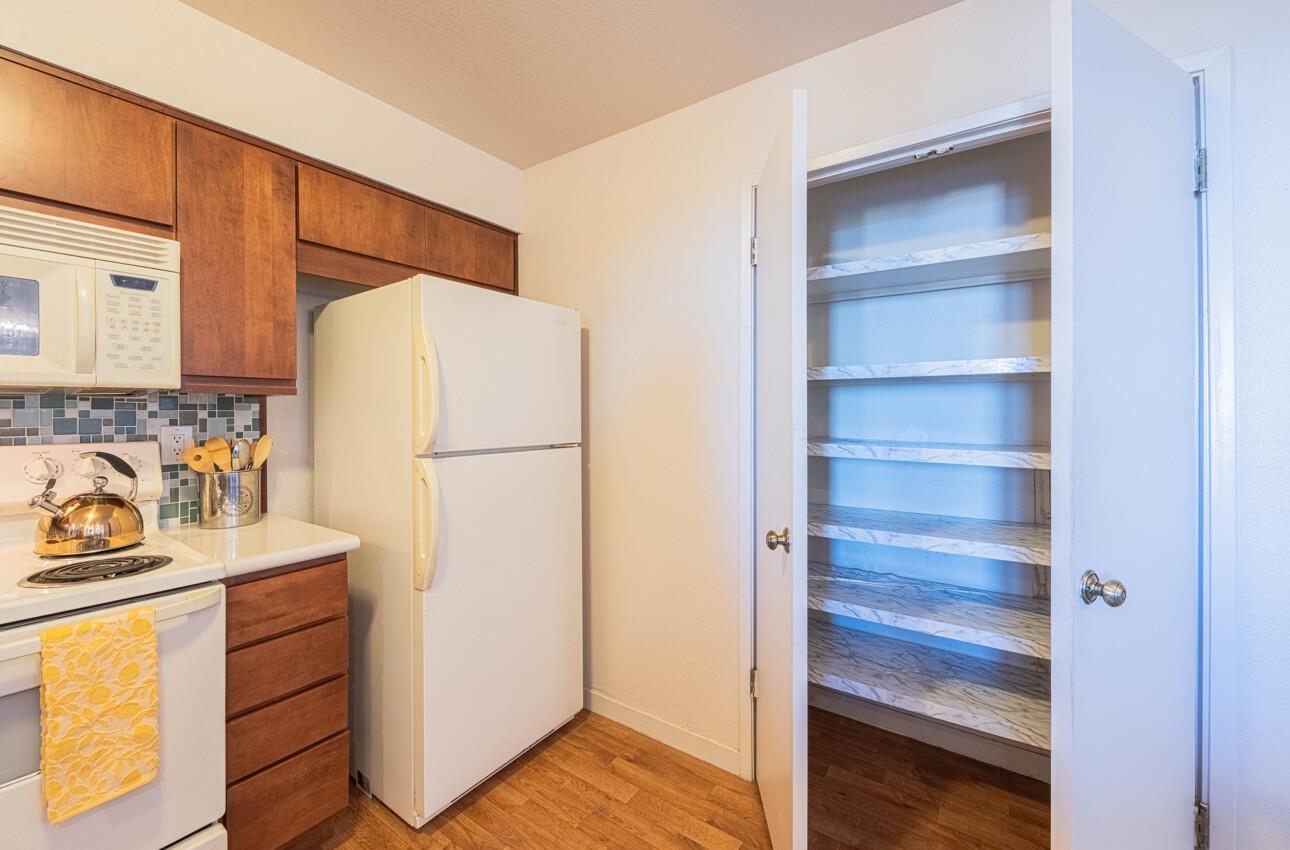 585 Hawthorne Street, Unit 103 Monterey, CA 93940 - Photo 15 of 30 a view of walk in closet with empty racks
