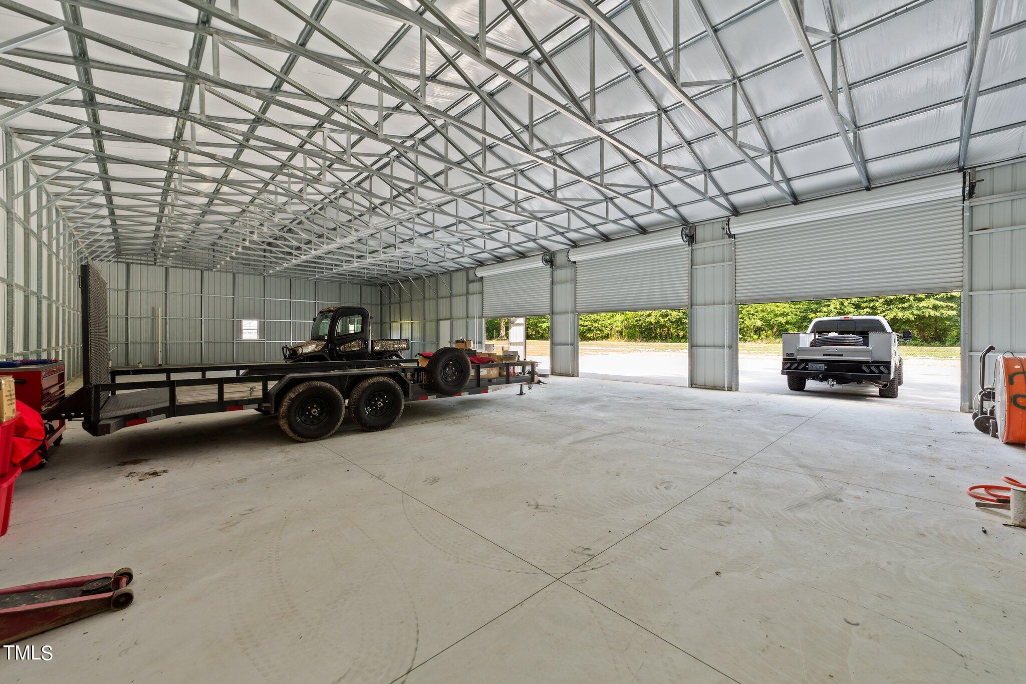 7588 Sadie Road Kenly, NC 27542 - Photo 13 of 58 a view of a cars parking space