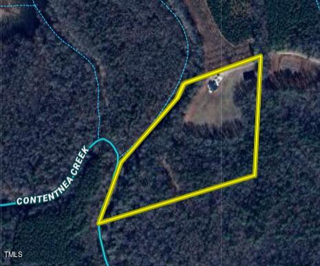 7588 Sadie Road Kenly, NC 27542 - Photo 3 of 58 a view of a park with iron fence
