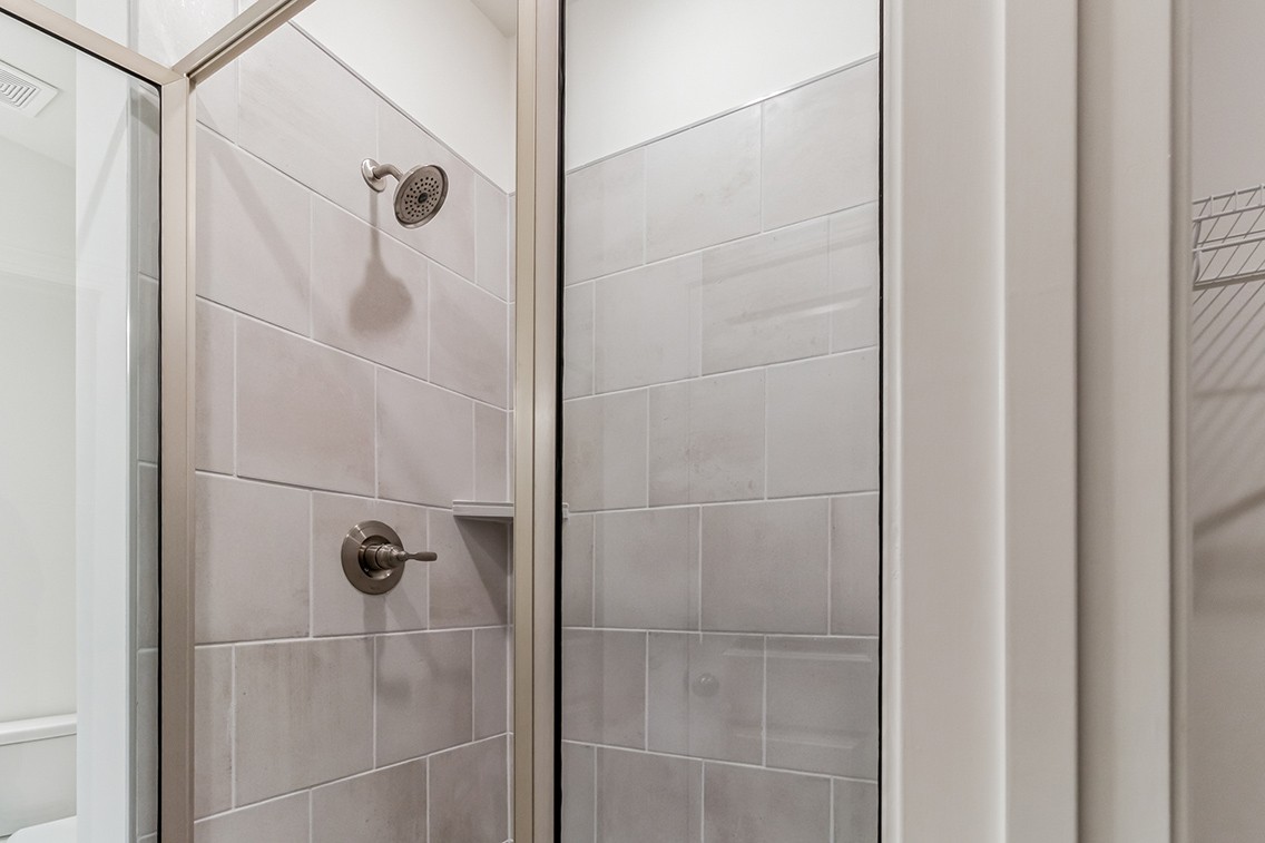 720 Fordham Drive Brentwood, TN 37027 - Photo 16 of 32 a bathroom with a glass shower door