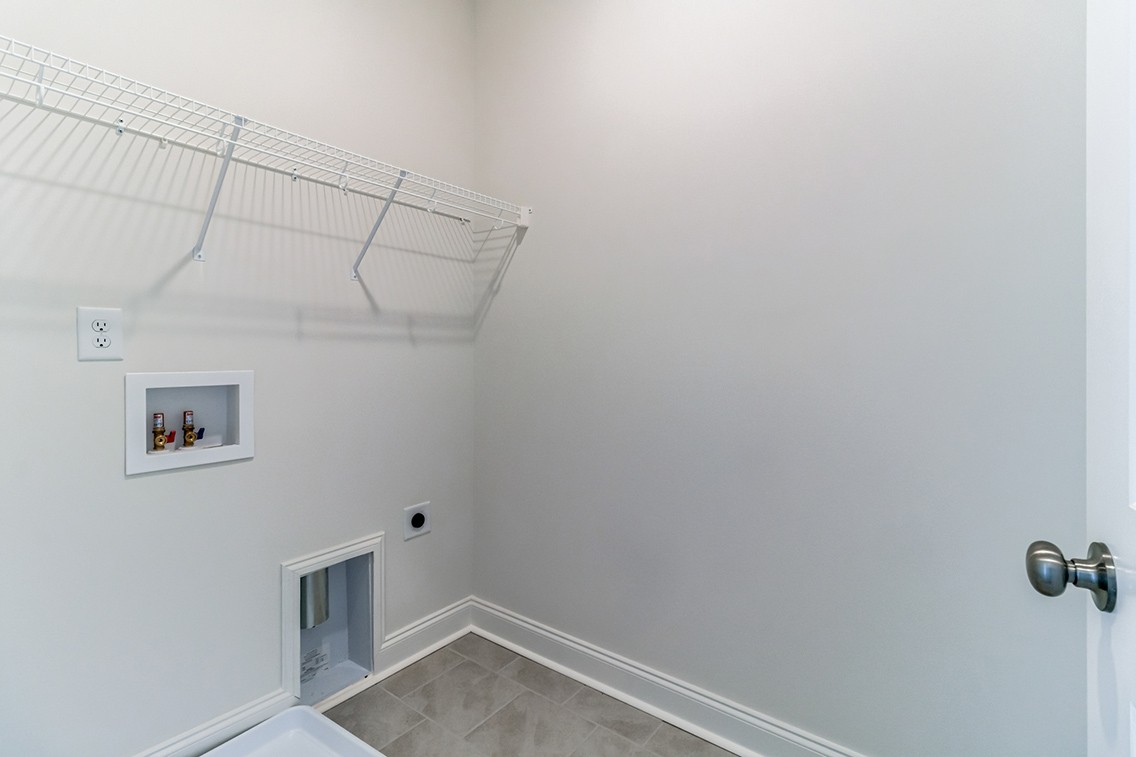 720 Fordham Drive Brentwood, TN 37027 - Photo 18 of 32 a view of a room with racks on the wall