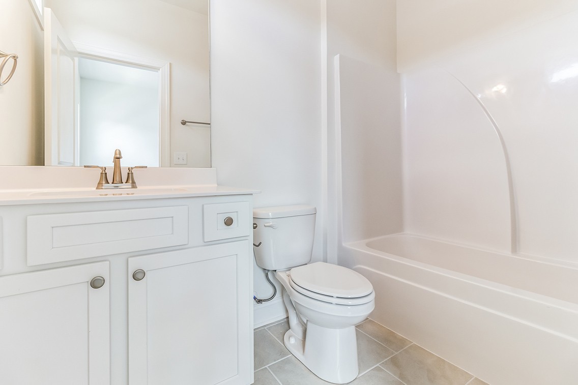 720 Fordham Drive Brentwood, TN 37027 - Photo 21 of 32 a bathroom with a sink toilet vanity and bathtub