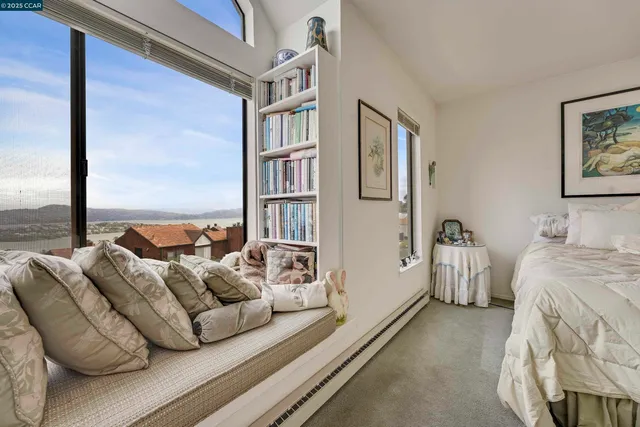 a view of a balcony with furniture