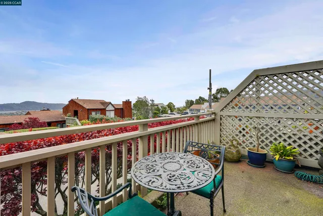 a view of a city with an ocean view