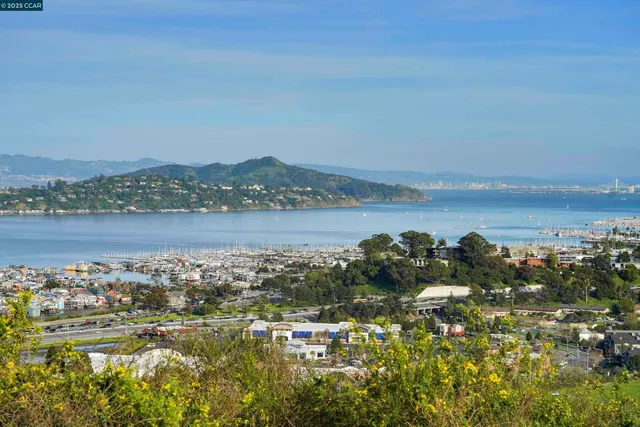 a view of a lake with mountain