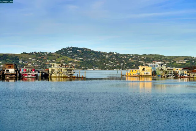 a view of a balcony with chairs