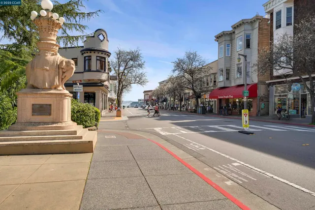 a building outdoor space with patio furniture and potted plants