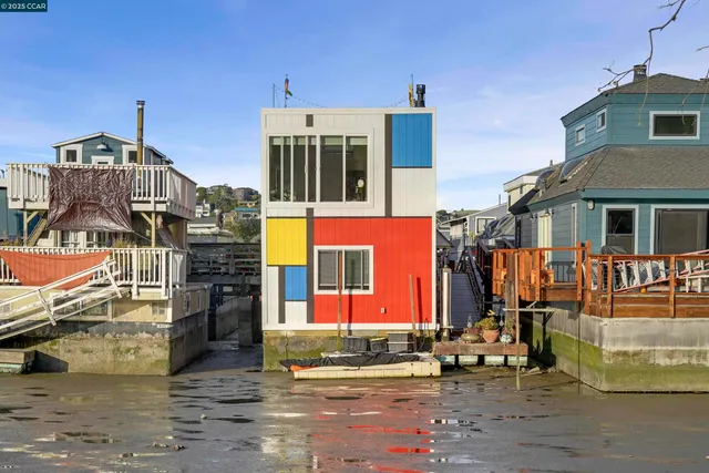a view of swimming pool with a yard and sitting area