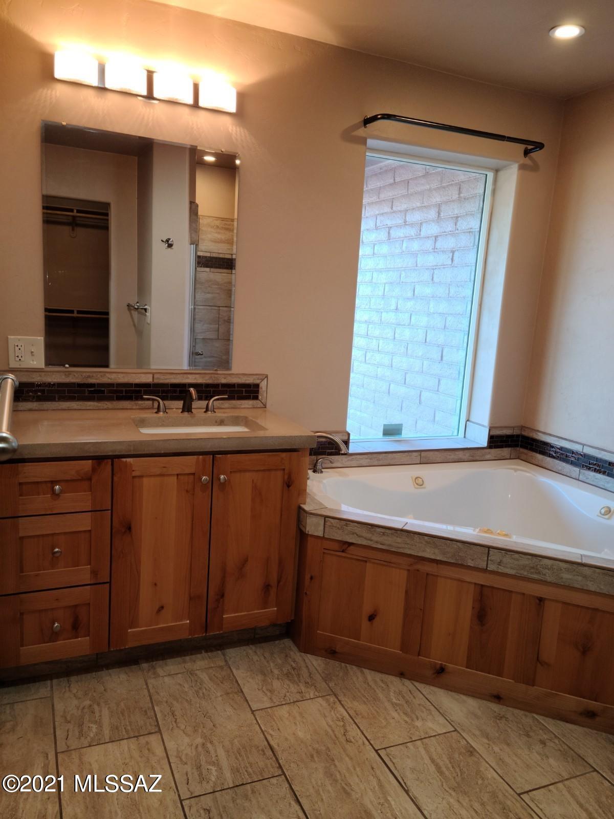1038 Oso Court Rio Rico, AZ 85648 - Photo 21 of 50 a view of a sink and a mirror