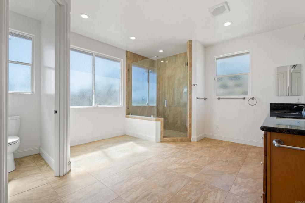 4261 Entrada Al Sol Bonsall, CA 92003 - Photo 23 of 49 a view of an empty room with a bathroom