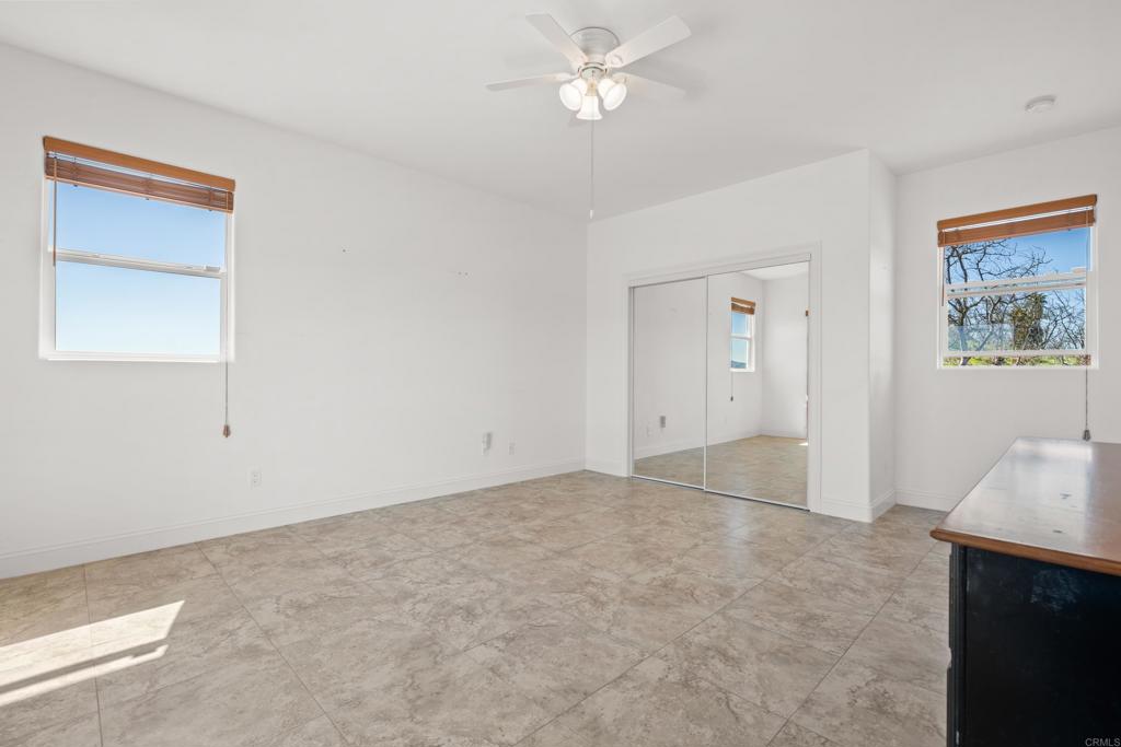 4261 Entrada Al Sol Bonsall, CA 92003 - Photo 33 of 49 a view of an empty room with a window