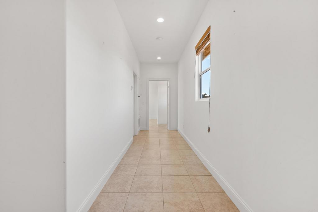 4261 Entrada Al Sol Bonsall, CA 92003 - Photo 36 of 49 a view of a hallway