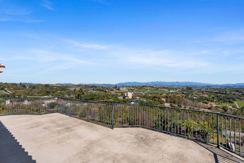4261 Entrada Al Sol Bonsall, CA 92003 - Photo 37 of 49 a view of a lake and a city