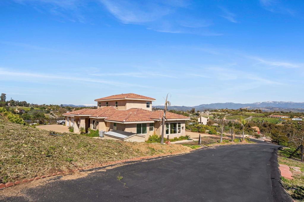 4261 Entrada Al Sol Bonsall, CA 92003 - Photo 46 of 49 an aerial view of residential houses with city view