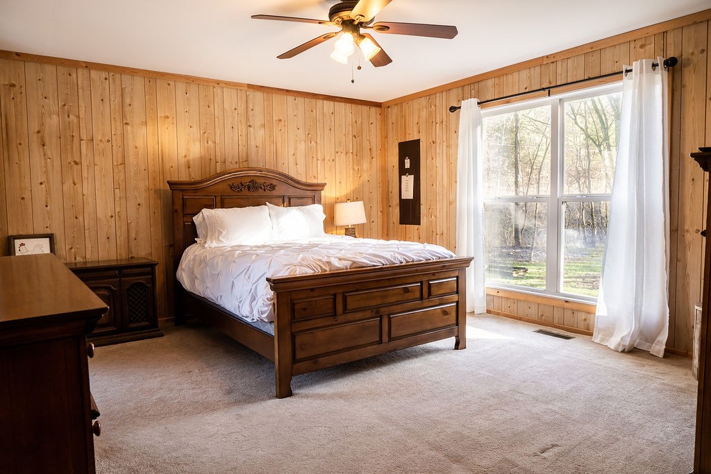 50 Hot Rock Hollow Road Fayetteville, TN 37334 - Photo 16 of 31 a bed sitting in a spacious bedroom next to a window