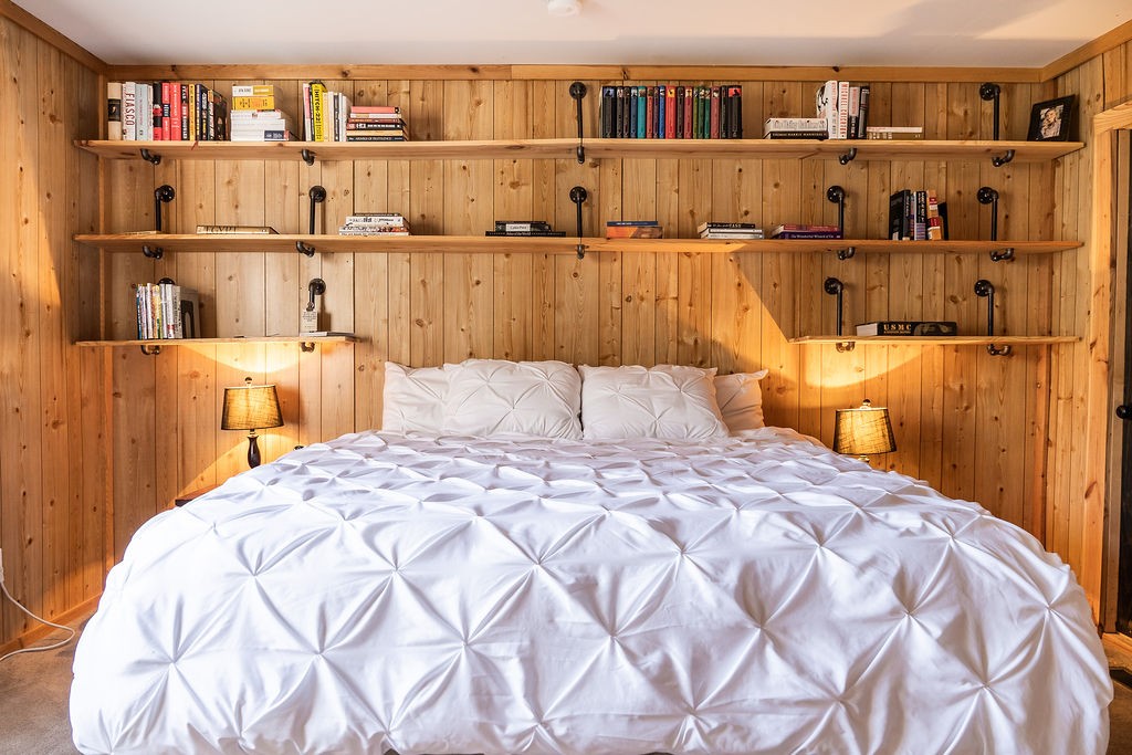 50 Hot Rock Hollow Road Fayetteville, TN 37334 - Photo 19 of 31 a bedroom with a bed and a shelf