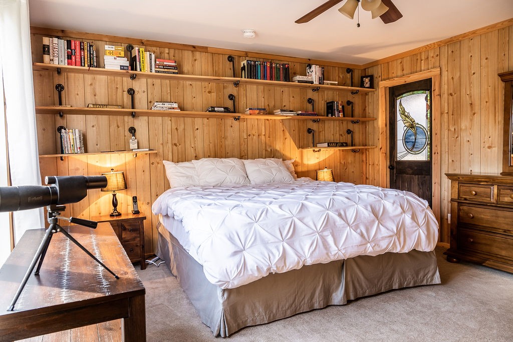 50 Hot Rock Hollow Road Fayetteville, TN 37334 - Photo 20 of 31 a bedroom with a bed and a bookshelf