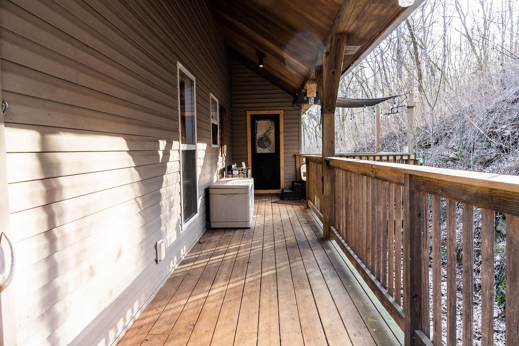 50 Hot Rock Hollow Road Fayetteville, TN 37334 - Photo 23 of 31 a view of a balcony with wooden floor and iron gate