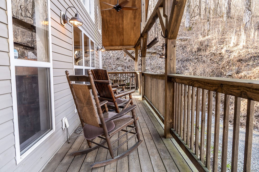 50 Hot Rock Hollow Road Fayetteville, TN 37334 - Photo 3 of 31 a view of balcony with wooden floor and outdoor seating