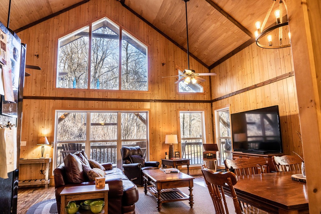 50 Hot Rock Hollow Road Fayetteville, TN 37334 - Photo 5 of 31 a living room with large windows and a flat screen tv