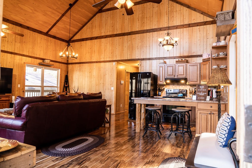 50 Hot Rock Hollow Road Fayetteville, TN 37334 - Photo 6 of 31 a view of a dining room with furniture a chandelier and wooden floor
