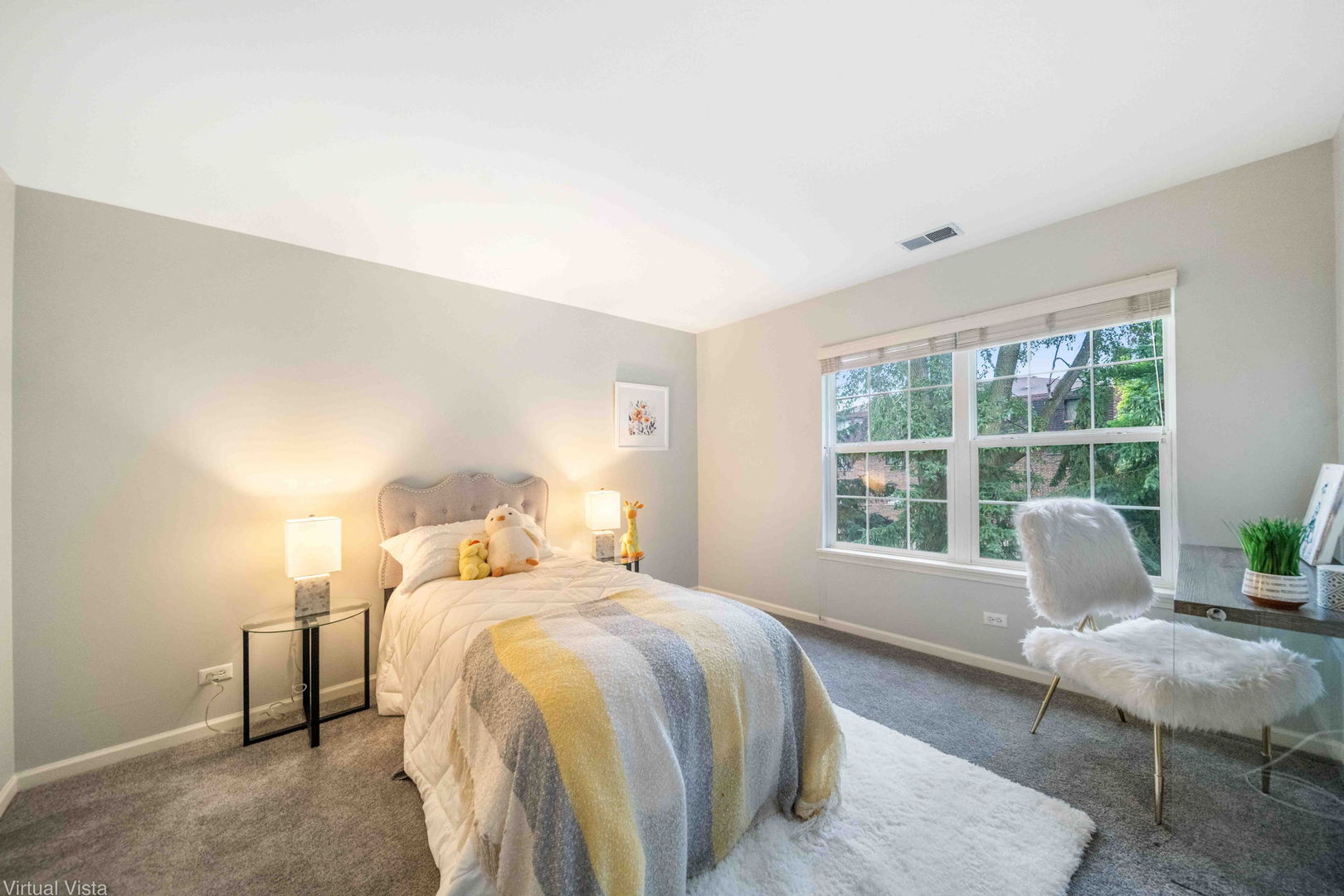 410 North River Road Naperville, IL 60540 - Photo 23 of 29 a bedroom with a bed and glass window