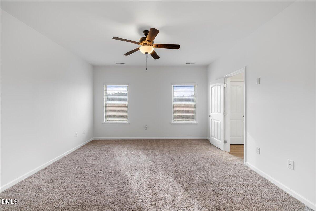 125 Flying Point Lane Clayton, NC 27520 - Photo 22 of 50 a view of empty room with window