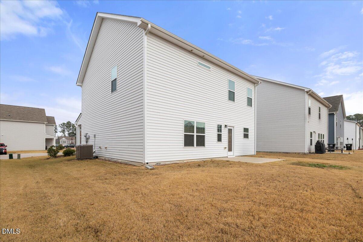 125 Flying Point Lane Clayton, NC 27520 - Photo 44 of 50 a view of a house with a yard