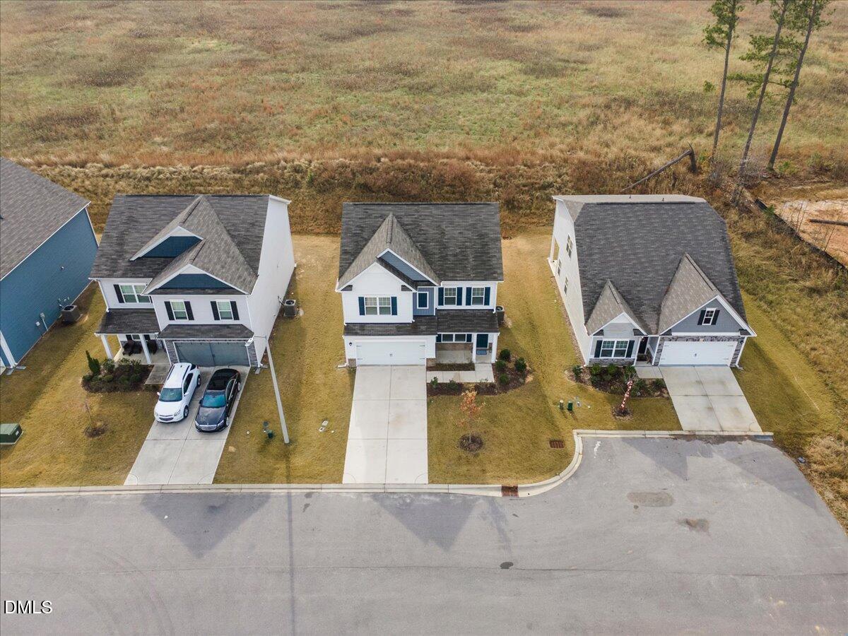 125 Flying Point Lane Clayton, NC 27520 - Photo 47 of 50 an aerial view of residential houses with outdoor space