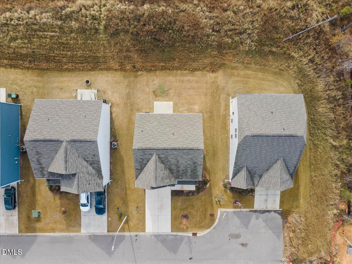 125 Flying Point Lane Clayton, NC 27520 - Photo 48 of 50 an aerial view of residential houses with outdoor space
