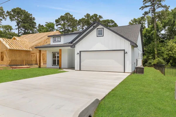 a view of outdoor space yard and garage